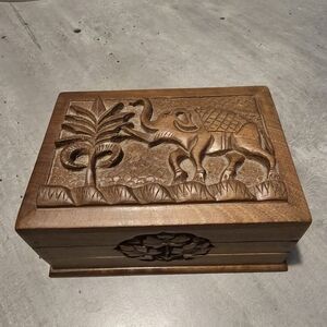 Vintage hand-carved wooden box with an elephant motif